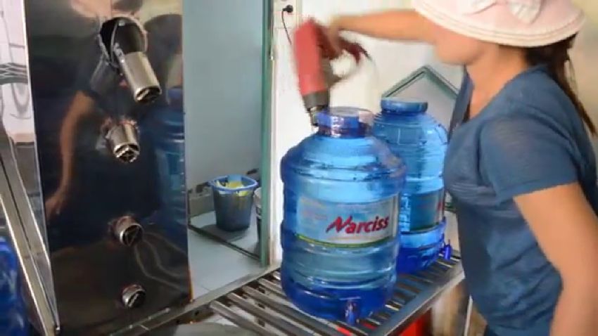 Ứng dụng máy co màng bình nước 20l