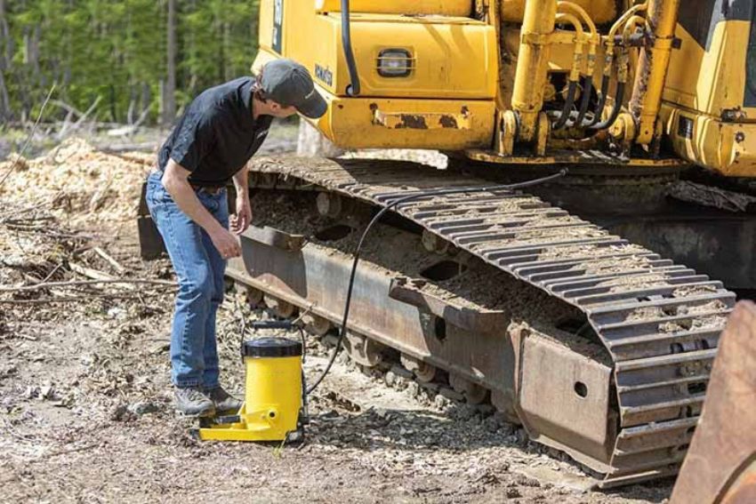 Bơm mỡ máy xúc 2